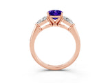 Rose gold Three-Stone Oval Cut Tanzanite Ring with Pear Side Stones and Four-Prong Setting_3