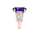 Rose gold Three-Stone Oval Cut Tanzanite Ring with Pear Side Stones and Four-Prong Setting_5
