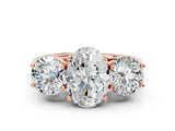 Rose gold Three-Stone Oval Diamond Engagement Ring with Prong Setting on a Classic Band_11