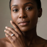 Rose gold Three-Stone Oval Diamond Engagement Ring with Prong Setting on a Classic Band_4