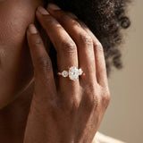 Rose gold Three-Stone Oval Diamond Engagement Ring with Prong Setting on a Classic Band_5