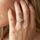 Rose gold Three-Stone Oval Diamond Ring with Channel Band and Prong Setting_8