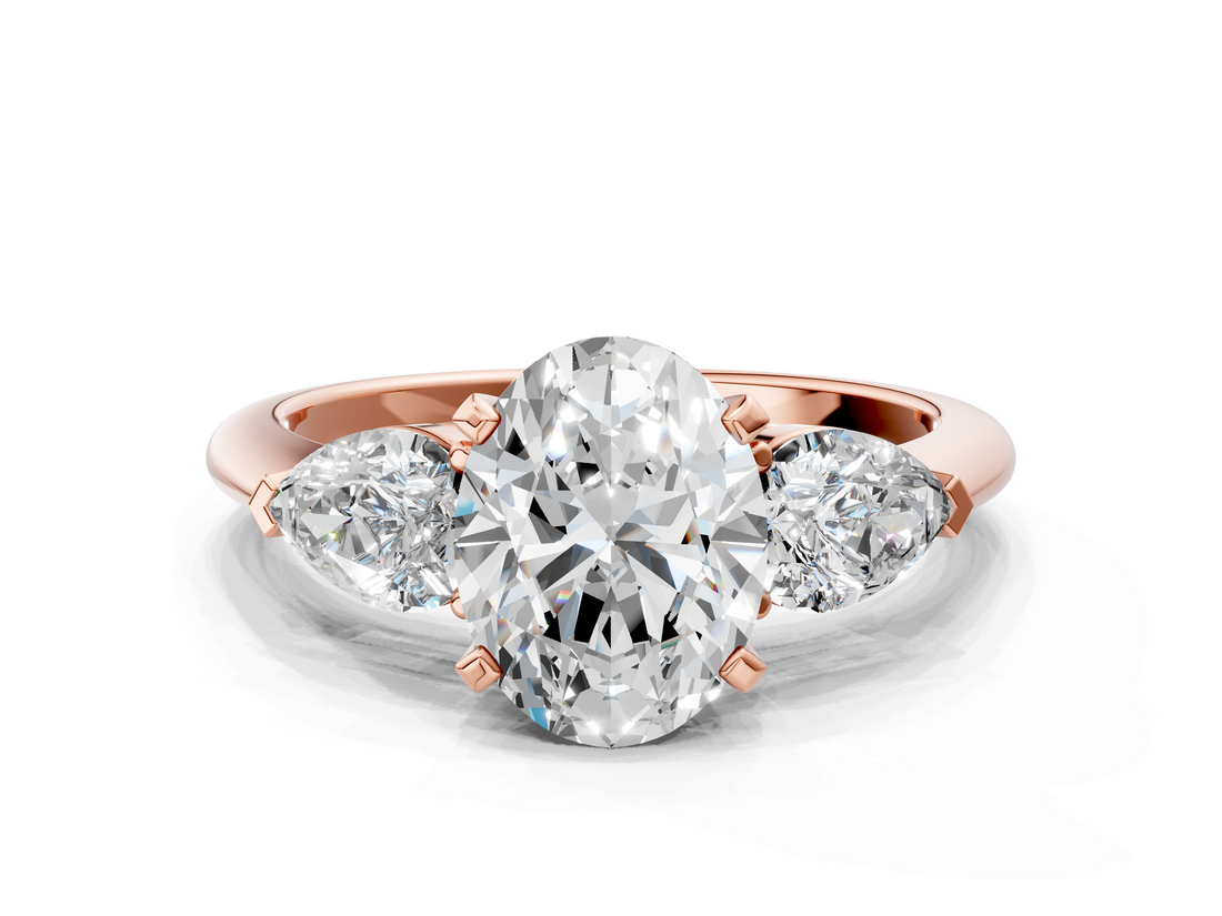 Rose gold Three-Stone Oval Diamond Ring with Pear Side Stones in Four-Prong Setting_49