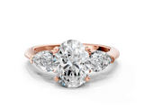 Rose gold Three-Stone Oval Diamond Ring with Pear Side Stones in Four-Prong Setting_49