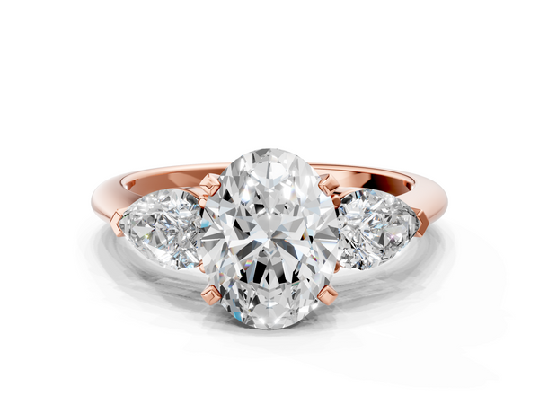 Rose gold Three-Stone Oval Cut Diamond Ring with Pear Side Stones and Four-Prong Setting