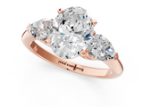 Rose gold Three-Stone Oval Diamond Ring with Pear Side Stones in Four-Prong Setting_50