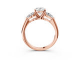 Rose gold Three-Stone Oval Diamond Ring with Pear Side Stones in Four-Prong Setting_52