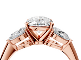 Rose gold Three-Stone Oval Diamond Ring with Pear Side Stones in Four-Prong Setting_53