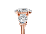 Rose gold Three-Stone Oval Diamond Ring with Pear Side Stones in Four-Prong Setting_54