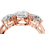 Rose gold Three-Stone Oval Diamond Ring with Round Side Stones, Classic Band, and Four-Prong Setting_10