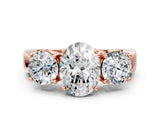 Rose gold Three-Stone Oval Diamond Ring with Round Side Stones, Classic Band, and Four-Prong Setting_6