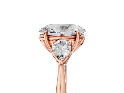 Rose gold Three-Stone Oval Diamond Solitaire Ring with Pear Side Stones and Four-Prong Setting_65