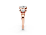 Rose gold Three-Stone Oval and Princess Cut Diamond Ring with Channel Band and Four-Prong Setting_18