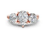 Rose gold Three-Stone Pear Brilliant Cut Solitaire Ring with Prong Setting on a Classic Band