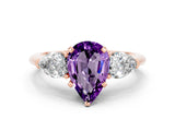 Rose gold Three-Stone Pear Cut Amethyst Ring with Pear Side Stones and Four-Prong Setting