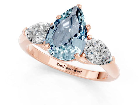 Rose gold Three-Stone Pear Cut Aquamarine Ring with Pear Side Stones and Four-Prong Setting_1