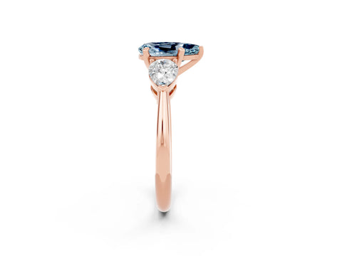Rose gold Three-Stone Pear Cut Aquamarine Ring with Pear Side Stones and Four-Prong Setting_2