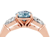 Rose gold Three-Stone Pear Cut Aquamarine Ring with Pear Side Stones and Four-Prong Setting_4