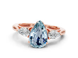 Rose gold Three-Stone Pear Cut Aquamarine Ring with Pear  Side Stones in Four-Prong Setting_12