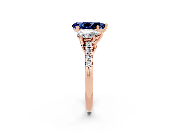 Rose gold Three-Stone Pear Cut Blue Sapphire Ring with Round  Pavé Band and Prong Setting