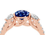 Rose gold Three-Stone Pear Cut Blue Sapphire Ring with Pavé Band and Prong Setting_16