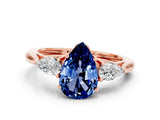 Rose gold Three-Stone Pear Cut Blue Sapphire Ring with Pear  Side Stones in Four-Prong Setting_12