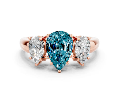 Rose gold Three-Stone Pear Cut Blue Topaz Engagement Ring with Prong Setting
