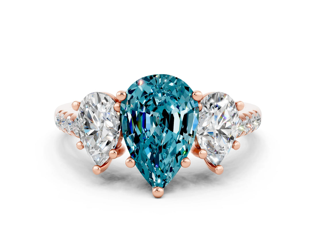 Rose gold Three-Stone Pear Cut Blue Topaz Ring with Pavé Band and Prong Setting_12