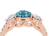 Rose gold Three-Stone Pear Cut Blue Topaz Ring with Pavé Band and Prong Setting_16