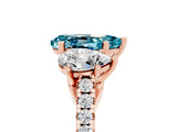 Rose gold Three-Stone Pear Cut Blue Topaz Ring with Pavé Band and Prong Setting_17