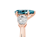 Rose gold Three-Stone Pear Cut Blue Topaz Ring with Pear Side Stones and Four-Prong Setting_5