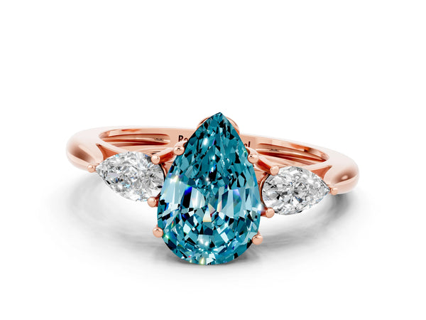 Rose gold Three-Stone Pear Cut Blue Topaz Ring with Pear  Side Stones in Four-Prong Setting