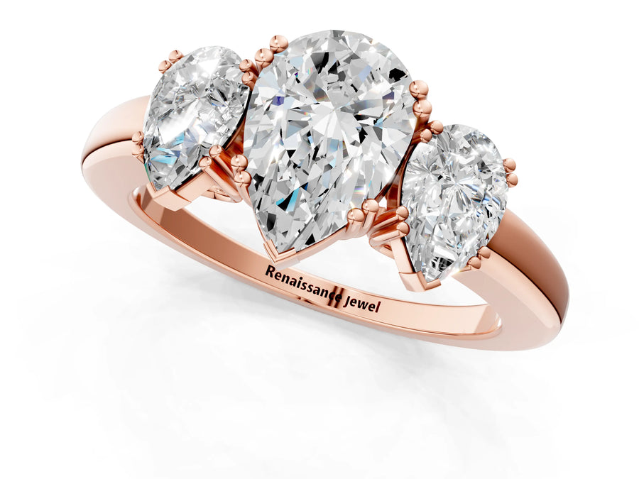 Rose gold Three-Stone Pear Cut Cut Diamond Ring with Channel Set Band and Four-Prong Setting