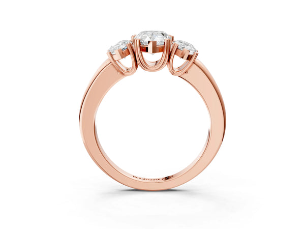 Rose gold Three-Stone Pear Cut Cut Diamond Ring with Channel Set Band and Four-Prong Setting