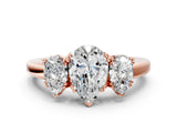 Rose gold Three-Stone Pear Cut Cut Diamond Ring with Channel Set Band and Four-Prong Setting_31