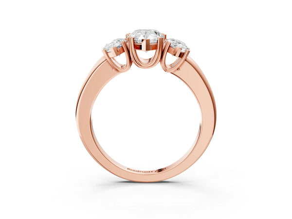Rose gold Three-Stone Pear Cut Cut Diamond Ring with Channel Set Band and Four-Prong Setting