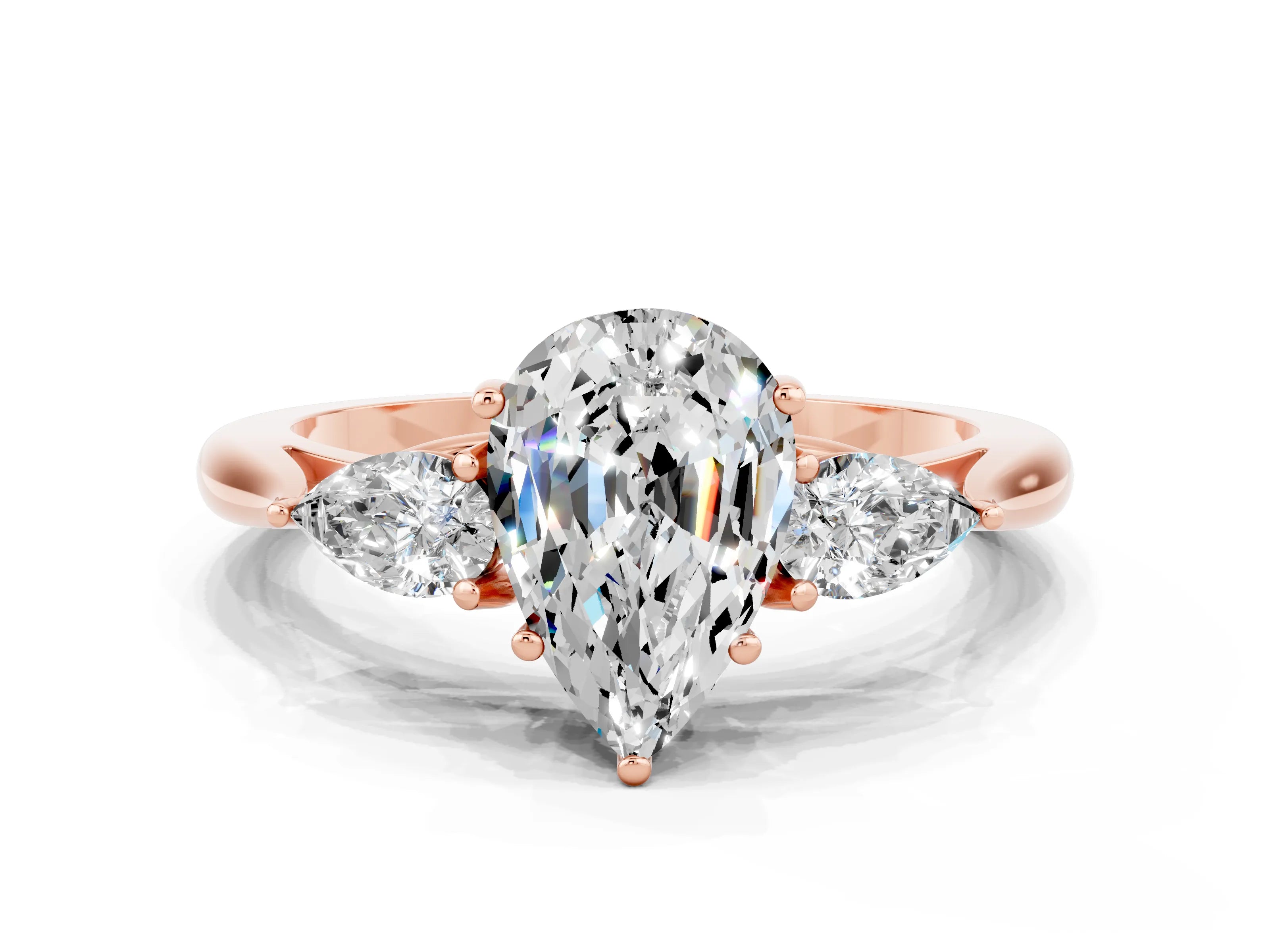 Rose gold Three-Stone Pear Cut Cut Diamond Ring with Pear Side Stones in Four-Prong Setting