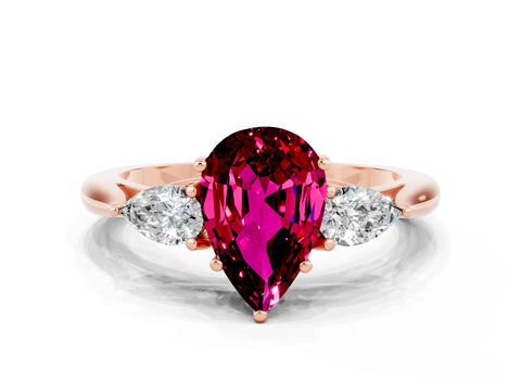 Rose gold Three-Stone Pear Cut Cut Diamond Ring with Pear Side Stones in Four-Prong Setting