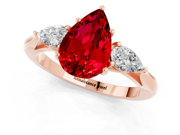 Rose gold Three-Stone Pear Cut Cut Diamond Ring with Pear Side Stones in Four-Prong Setting