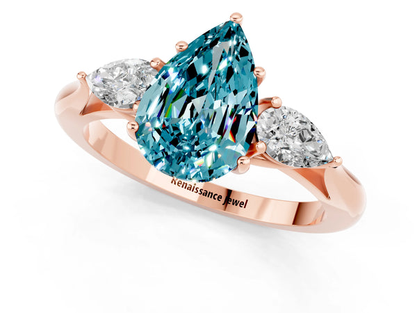 Rose gold Three-Stone Pear Cut Cut Diamond Ring with Pear Side Stones in Four-Prong Setting