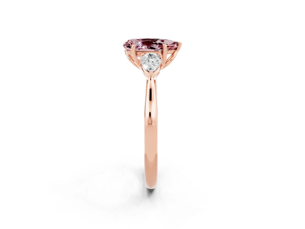 Rose gold Three-Stone Pear Cut Cut Diamond Ring with Pear Side Stones in Four-Prong Setting