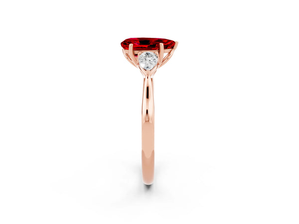 Rose gold Three-Stone Pear Cut Cut Diamond Ring with Pear Side Stones in Four-Prong Setting