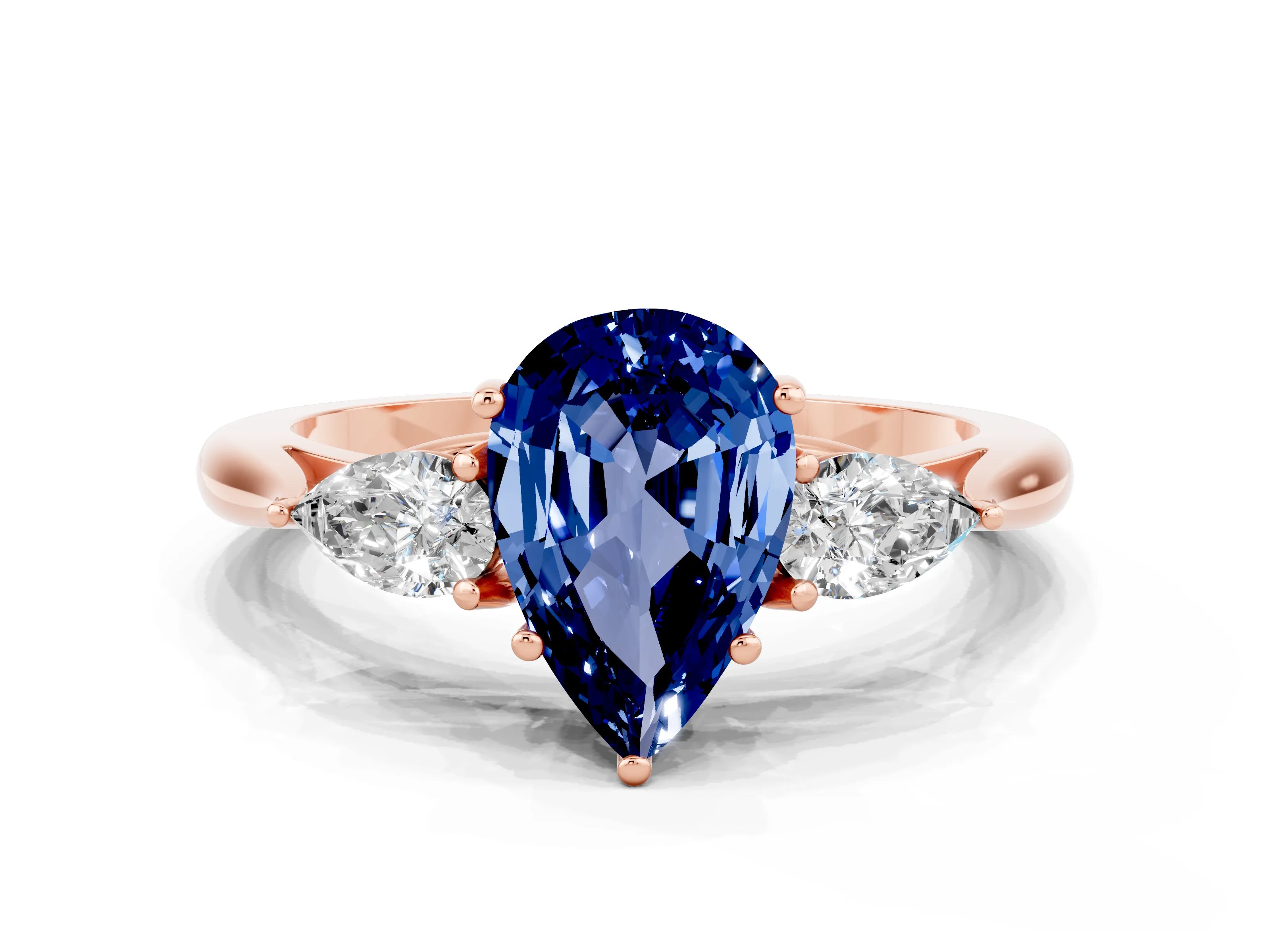 Rose gold Three-Stone Pear Cut Cut Diamond Ring with Pear Side Stones in Four-Prong Setting