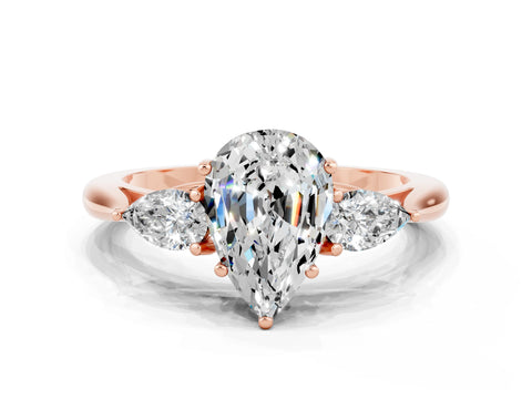 Rose gold Three-Stone Pear Cut Cut Diamond Ring with Pear Side Stones in Four-Prong Setting