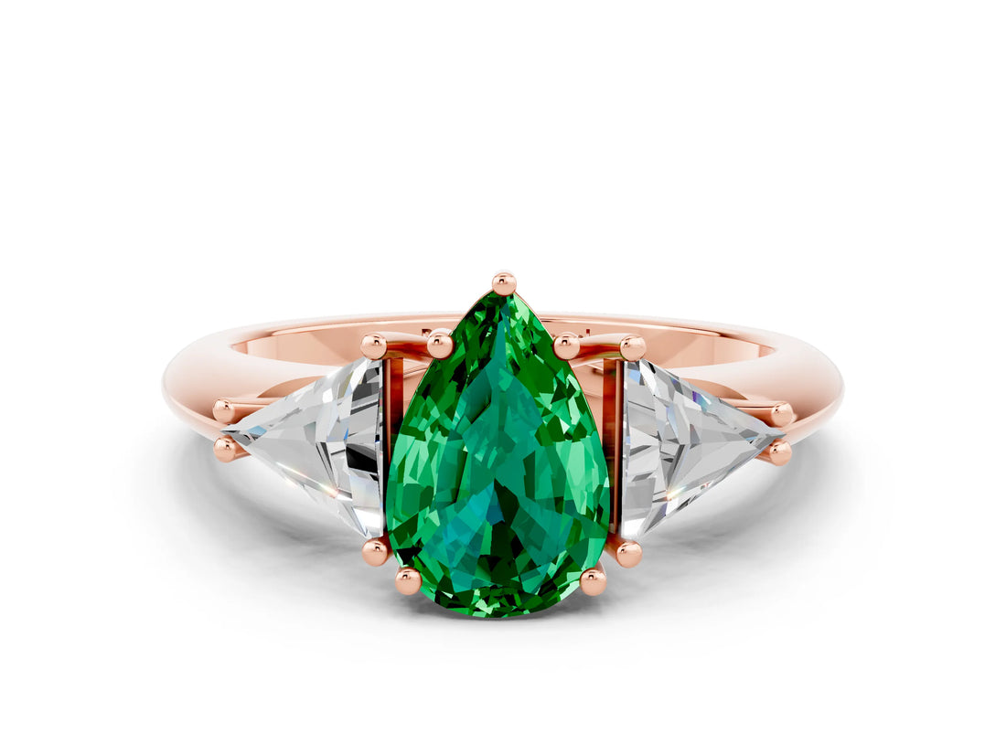 Rose gold Three-Stone Pear Cut Cut Diamond Ring with Trillion Side Stones and Four-Prong Setting