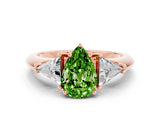 Rose gold Three-Stone Pear Cut Cut Diamond Ring with Trillion Side Stones and Four-Prong Setting