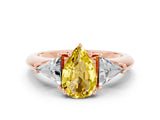 Rose gold Three-Stone Pear Cut Cut Diamond Ring with Trillion Side Stones and Four-Prong Setting