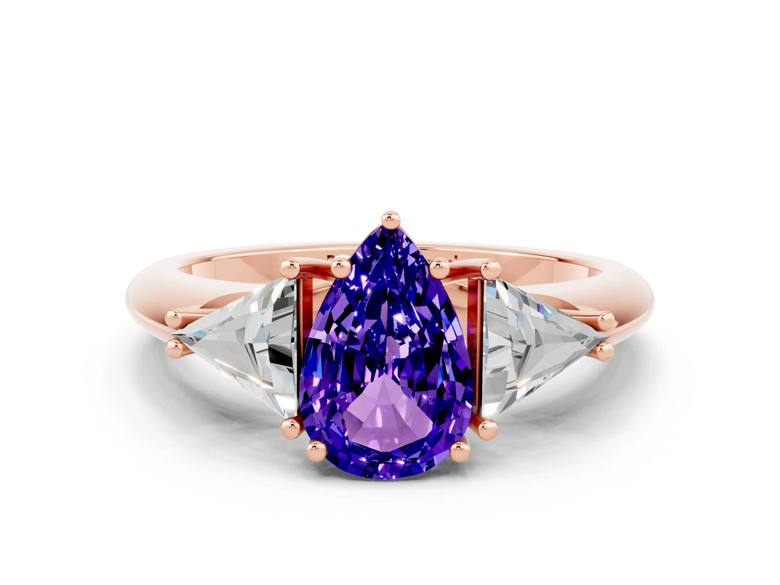 Rose gold Three-Stone Pear Cut Cut Diamond Ring with Trillion Side Stones and Four-Prong Setting