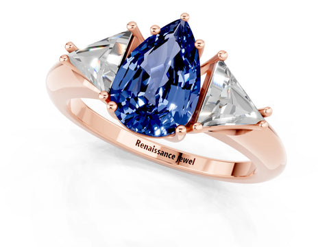 Rose gold Three-Stone Pear Cut Cut Diamond Ring with Trillion Side Stones and Four-Prong Setting_1