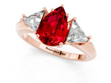Rose gold Three-Stone Pear Cut Cut Diamond Ring with Trillion Side Stones and Four-Prong Setting_1